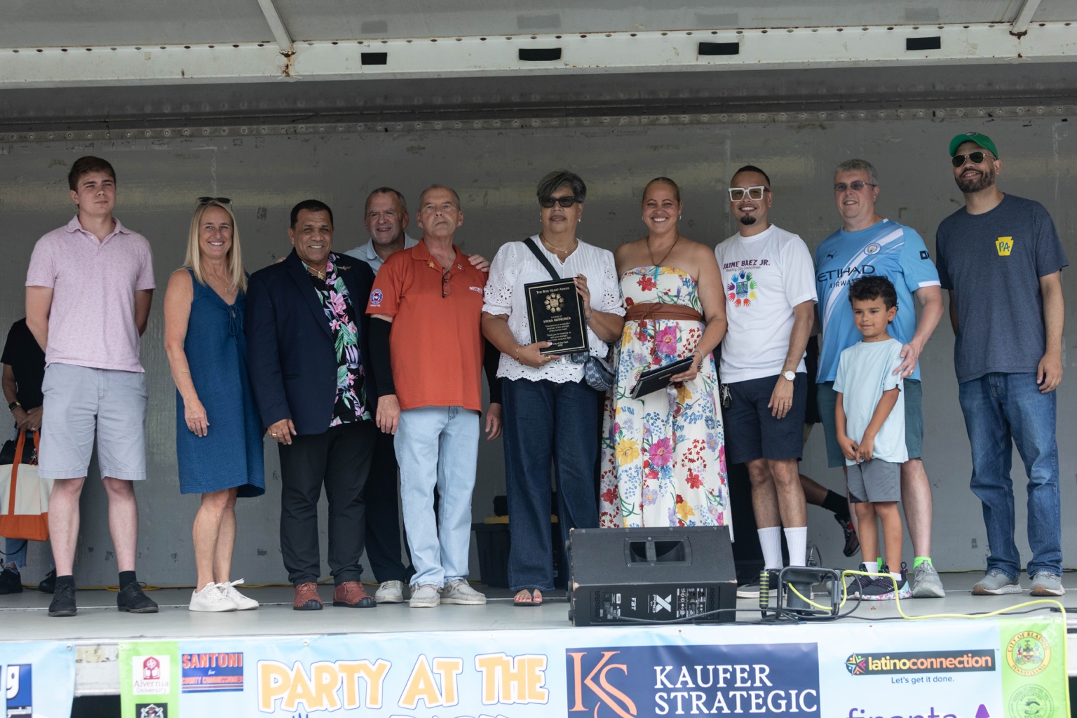 Jaime with community members on the Party at the Park stage