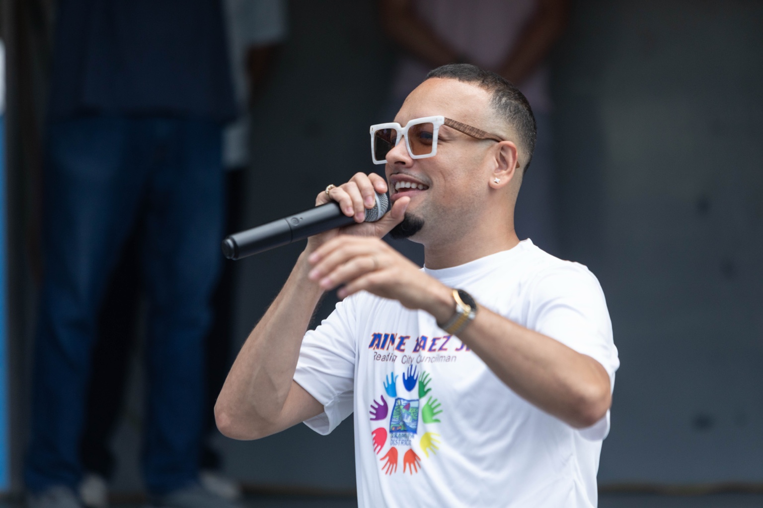 Jaime speaking to the crowd at Party at the Park